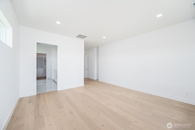 6773 Rd E.2 NE, Moses Lake, WA 98837 - empty room with light wood-type flooring, baseboards, and recessed lighting