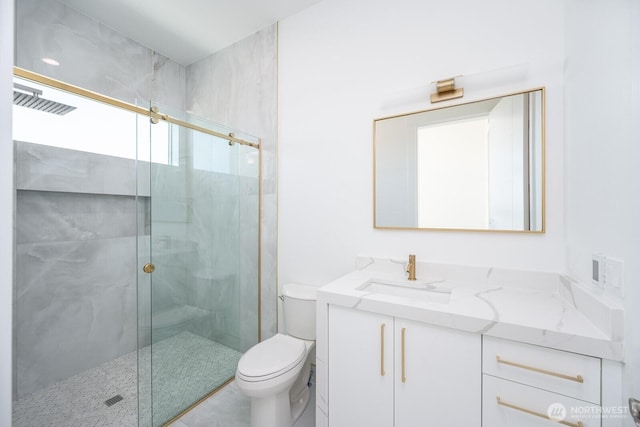 6773 Rd E.2 NE, Moses Lake, WA 98837 - bathroom featuring a marble finish shower, toilet, and vanity
