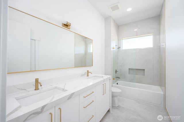 6773 Rd E.2 NE, Moses Lake, WA 98837 - bathroom featuring toilet, double vanity, and shower / tub combination