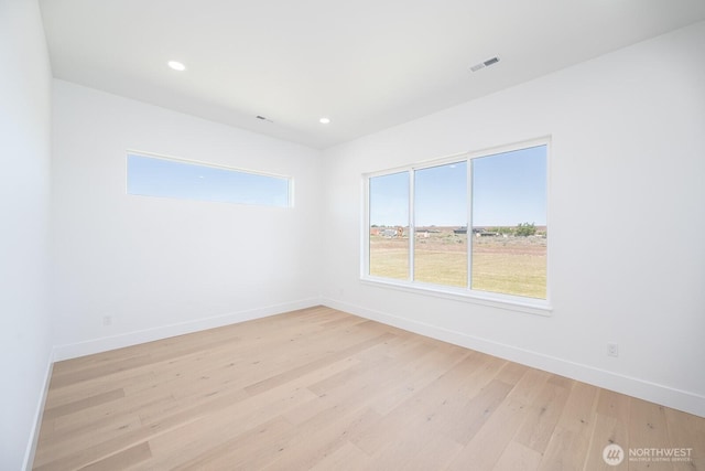 6773 Rd E.2 NE, Moses Lake, WA 98837 - spare room featuring light wood finished floors, baseboards, and recessed lighting