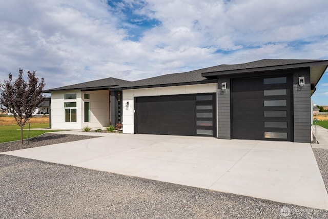 6773 Rd E.2 NE, Moses Lake, WA 98837 - prairie-style house featuring an attached garage and concrete driveway