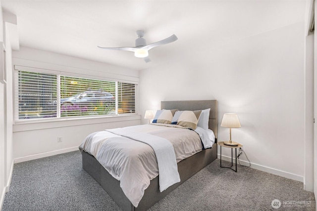 bedroom featuring carpet, baseboards, and a ceiling fan