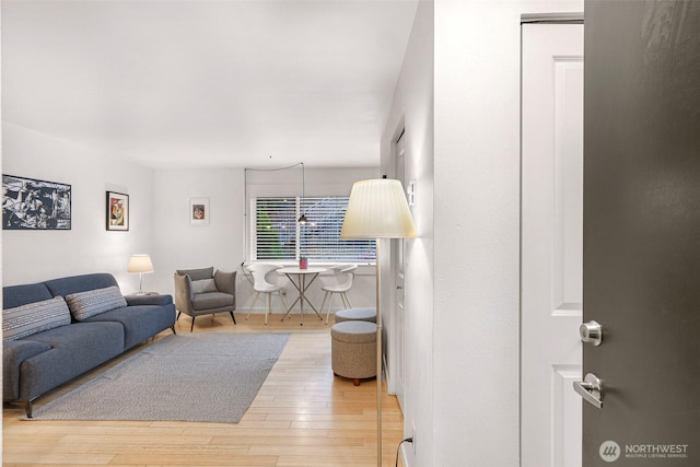 living area featuring hardwood / wood-style flooring