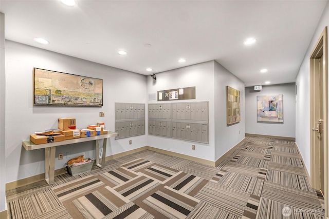 view of property's community featuring mail area and recessed lighting