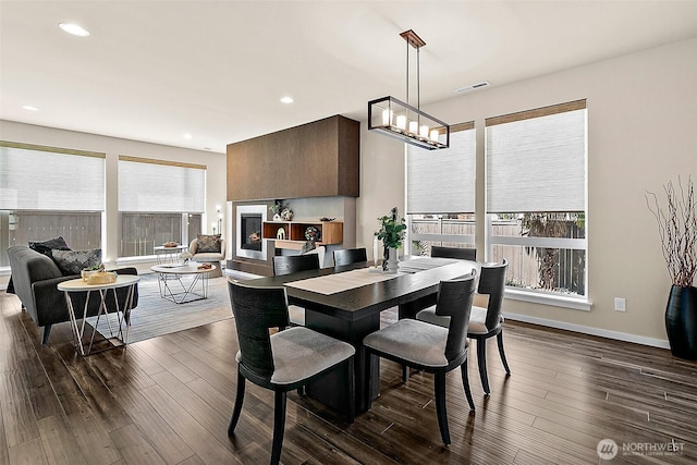 30429 121st Pl SE, Auburn, WA 98092 - dining room with dark wood-style flooring, baseboards, recessed lighting, and a chandelier