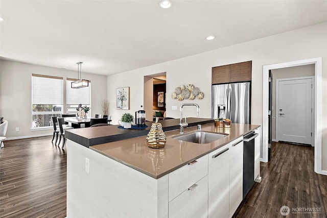 30429 121st Pl SE, Auburn, WA 98092 - kitchen featuring a sink, stainless steel refrigerator with ice dispenser, dark countertops, modern cabinets, and recessed lighting