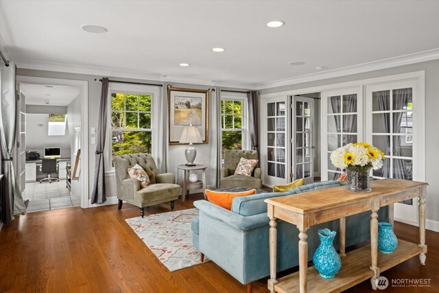 living area with a desk, ornamental molding, wood finished floors, and recessed lighting