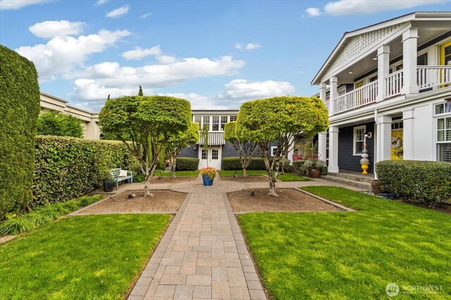 surrounding community featuring a lawn