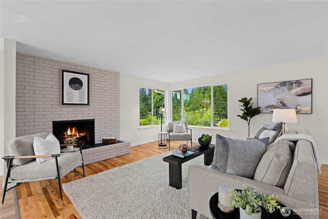 8716 Main St, Edmonds, WA 98026 - living area with a fireplace and light wood finished floors