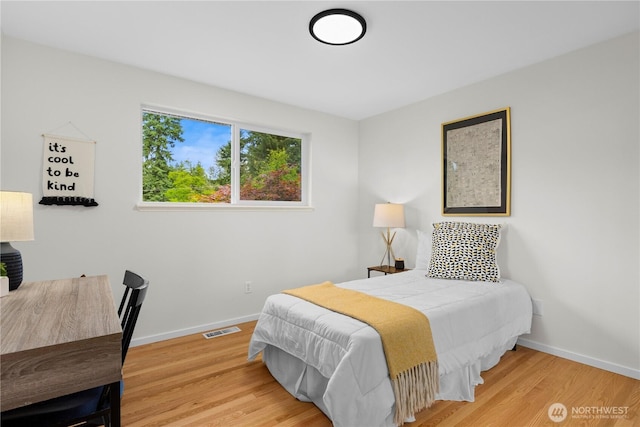 8716 Main St, Edmonds, WA 98026 - bedroom with wood finished floors and baseboards