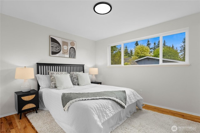 8716 Main St, Edmonds, WA 98026 - bedroom featuring wood finished floors and baseboards