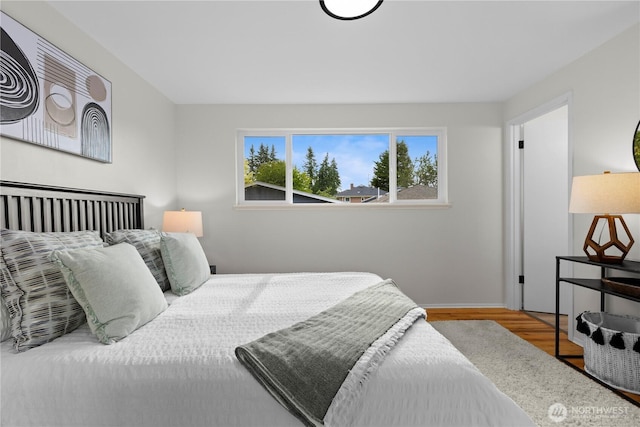 8716 Main St, Edmonds, WA 98026 - bedroom featuring wood finished floors and baseboards