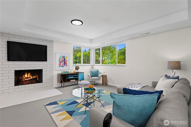 8716 Main St, Edmonds, WA 98026 - living area with a fireplace and a tray ceiling