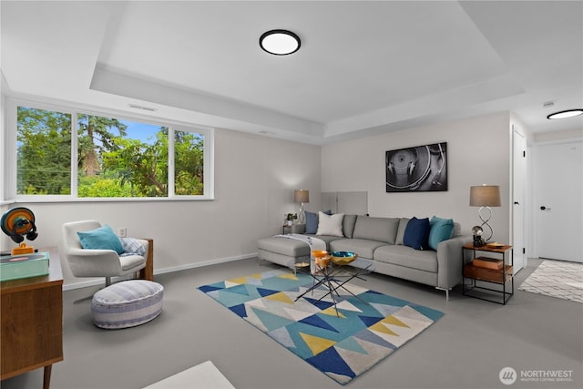 8716 Main St, Edmonds, WA 98026 - living room with a tray ceiling and finished concrete floors