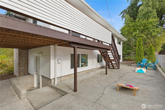 8716 Main St, Edmonds, WA 98026 - view of patio featuring stairs and a deck