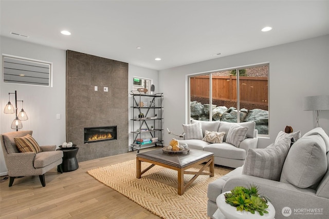 8112 131st Pl SE Unit 15, Snohomish, WA 98296 - living area featuring recessed lighting, wood finished floors, and a fireplace