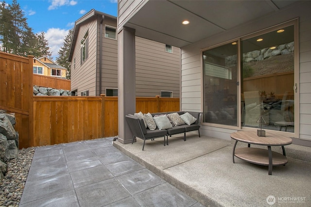 8112 131st Pl SE Unit 15, Snohomish, WA 98296 - view of patio / terrace featuring fence and an outdoor hangout area