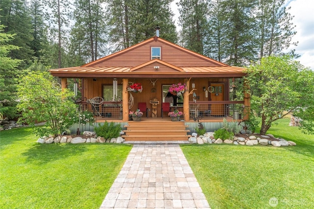 26 Newby Creek Rd, Twisp, WA 98856 - view of front of property with a standing seam roof, a porch, a metal roof, and a front yard