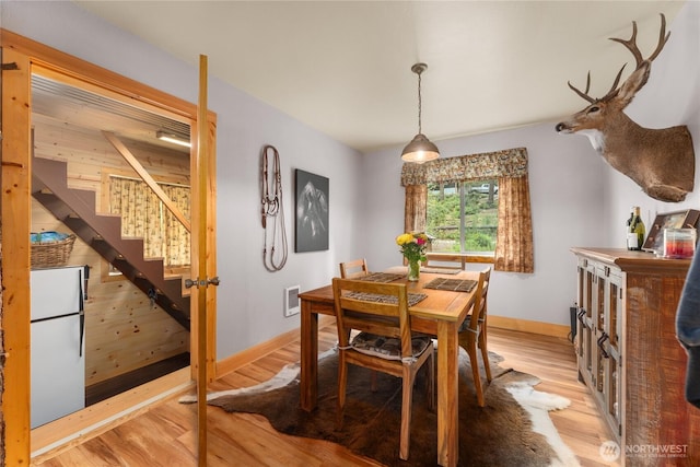 26 Newby Creek Rd, Twisp, WA 98856 - dining space featuring stairway, light wood-type flooring, and heating unit