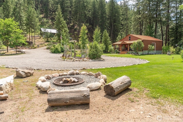 26 Newby Creek Rd, Twisp, WA 98856 - view of green lawn with a view of trees