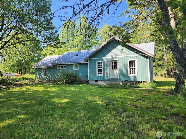 175 Stevens Rd, Chehalis, WA 98532 - rear view of house with metal roof and a lawn