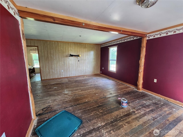 175 Stevens Rd, Chehalis, WA 98532 - empty room with wood-type flooring, wooden walls, healthy amount of natural light, and baseboards