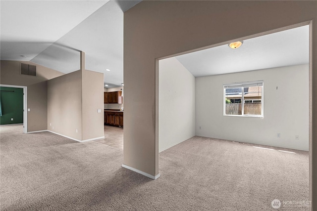 649 Sally Dr, Wenatchee, WA 98801 - unfurnished room with carpet flooring, baseboards, and vaulted ceiling