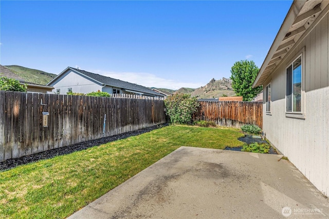 649 Sally Dr, Wenatchee, WA 98801 - view of yard with a patio and a mountain view