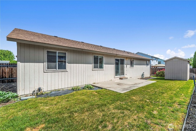 649 Sally Dr, Wenatchee, WA 98801 - back of property featuring a patio, a storage shed, an outdoor structure, and roof with shingles