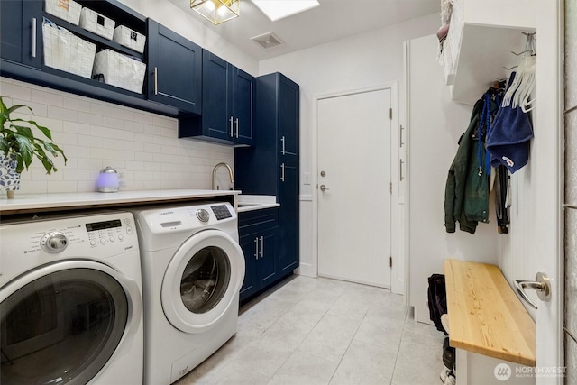 3341 Nicole Ln, Custer, WA 98240 - washroom featuring independent washer and dryer, cabinet space, and light tile patterned floors