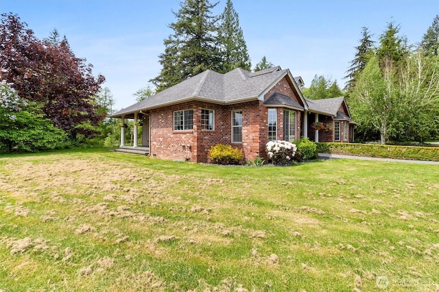 3341 Nicole Ln, Custer, WA 98240 - view of property exterior with brick siding and a yard