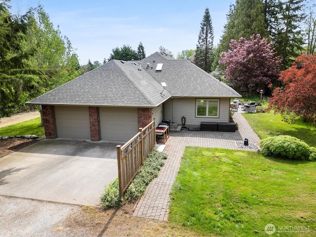 3341 Nicole Ln, Custer, WA 98240 - view of front of house with roof with shingles, a front lawn, a garage, concrete driveway, and brick siding