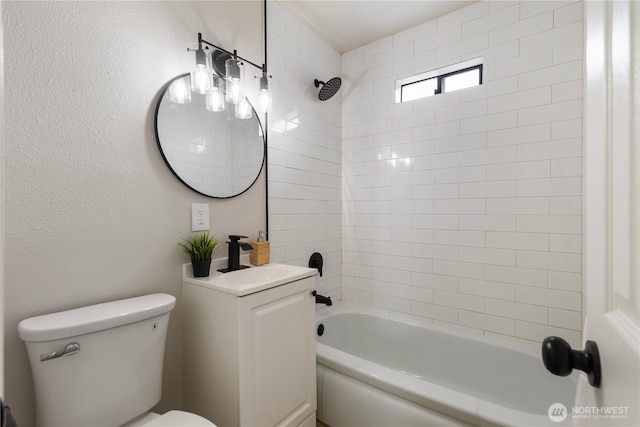 bathroom featuring bathtub / shower combination, toilet, and vanity