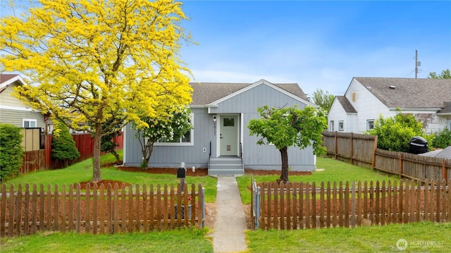 view of front of home featuring a shingled roof
