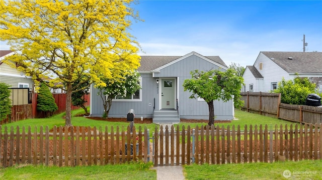 view of front of property with roof with shingles