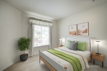 carpeted bedroom featuring baseboards