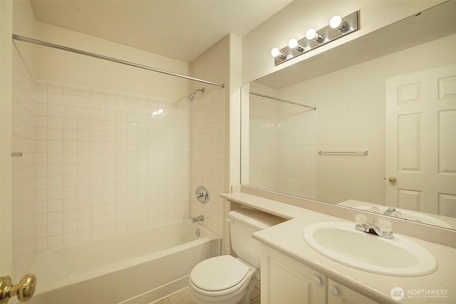 bathroom featuring toilet, shower / tub combination, and vanity