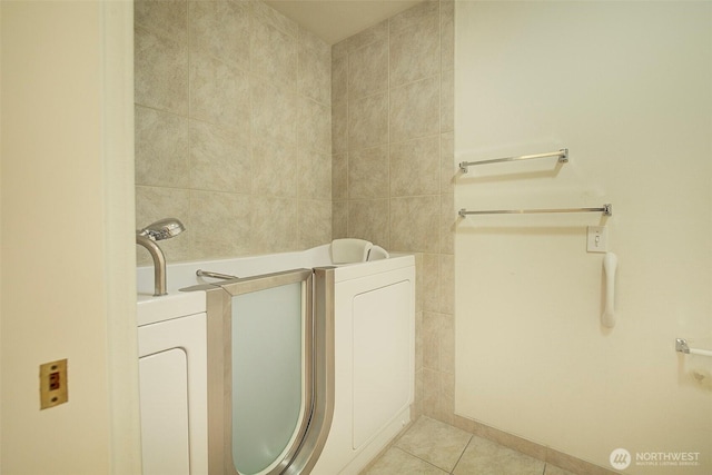 bathroom with tile patterned flooring