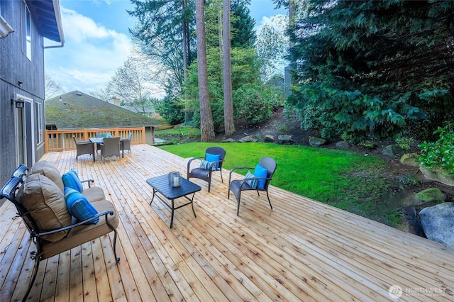11635 NE 95th St, Kirkland, WA 98033 - wooden terrace with outdoor dining space, a lawn, and an outdoor hangout area