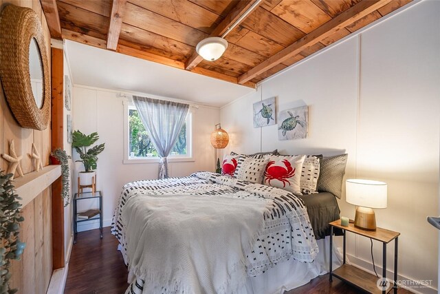 1011 231st Ln, Ocean Park, WA 98640 - bedroom with wooden ceiling with exposed beams and wood finished floors