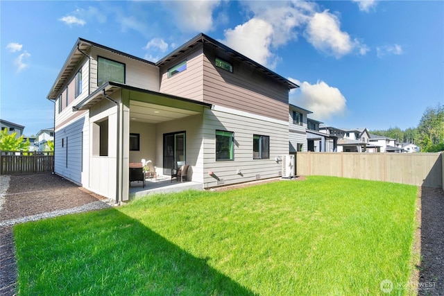 rear view of property with a patio area