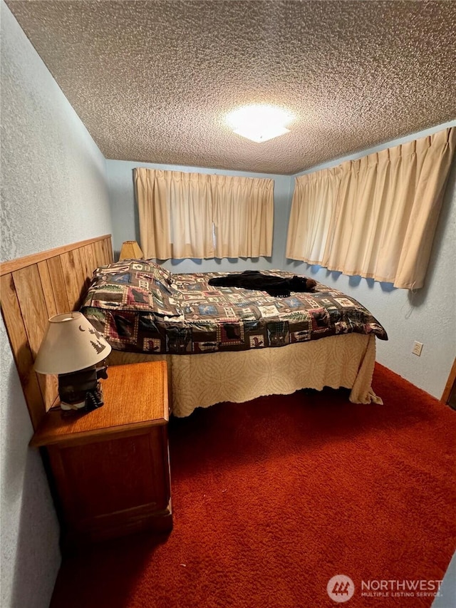 511 Old River Rd Unit 18, Naches, WA 98937 - carpeted bedroom featuring a textured wall and a textured ceiling