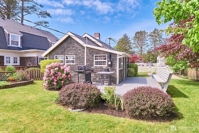 1214 Bay Ave, Ocean Park, WA 98640 - back of house with a chimney and a wooden deck