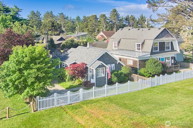 1214 Bay Ave, Ocean Park, WA 98640 - view of front of property featuring roof with shingles and a chimney