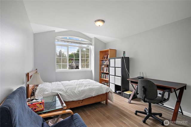16260 11th Ave NE, Shoreline, WA 98155 - bedroom with wood finished floors, a desk, and vaulted ceiling