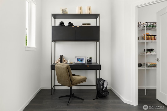 office space featuring dark wood finished floors and baseboards