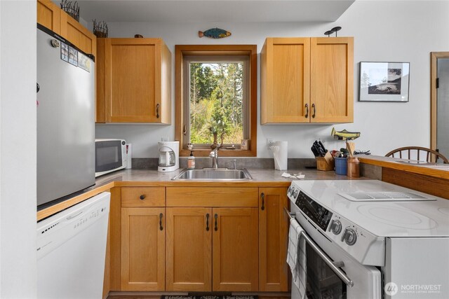 6166 Westside Rd, Cle Elum, WA 98922 - kitchen with white appliances, a sink, and light countertops