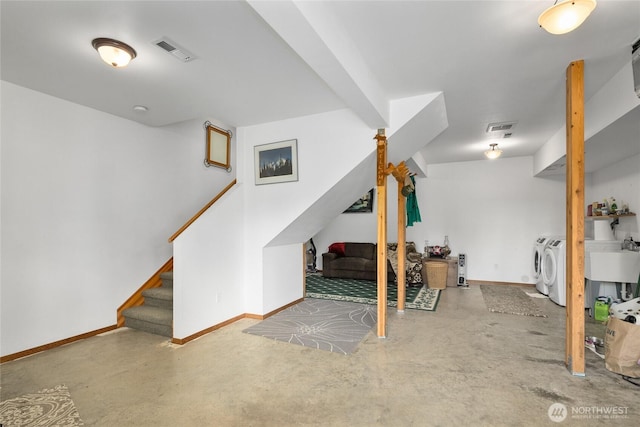6166 Westside Rd, Cle Elum, WA 98922 - finished basement with separate washer and dryer, stairs, baseboards, and a sink