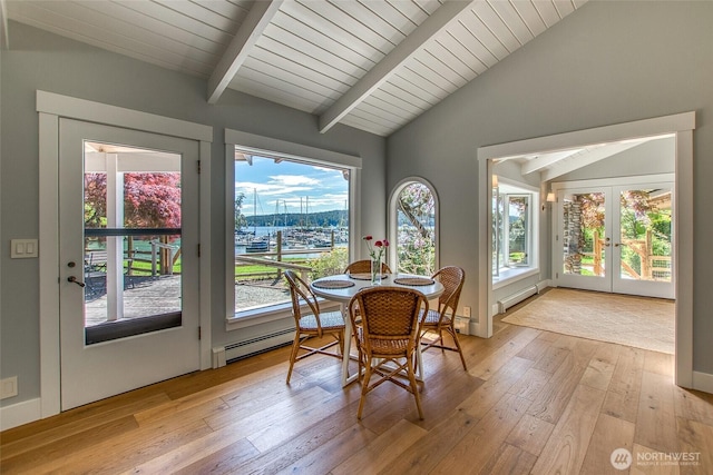 376 Killebrew Lake Rd, Orcas Island, WA 98280 - dining area with french doors, light wood-style flooring, a baseboard heating unit, and a baseboard radiator