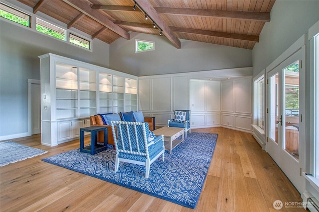 376 Killebrew Lake Rd, Orcas Island, WA 98280 - living area with wood ceiling, high vaulted ceiling, light wood-style flooring, beam ceiling, and a decorative wall